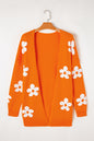 Orangefarbener, lockerer Strickcardigan mit Blumenmuster und offener Vorderseite