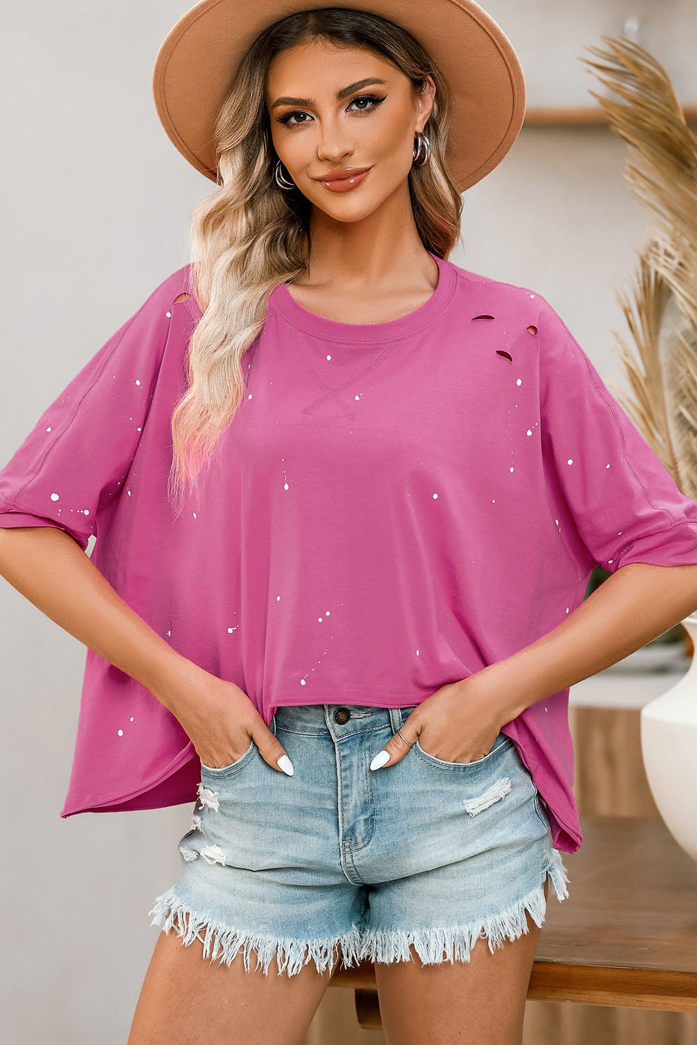 Rosa, gebleichtes Top mit asymmetrischem Saum im Used-Look und kurzen Ärmeln