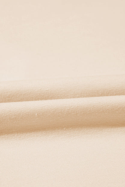 Beiges T-Shirt mit Rundhalsausschnitt und Nieten in Sternform in Übergröße
