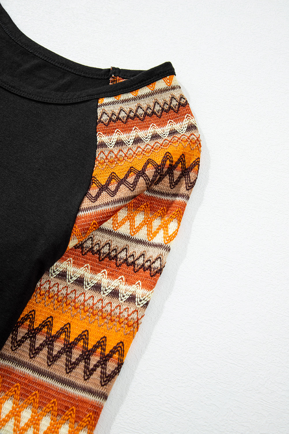 Oranges Raglan-Patchwork-Langarm-T-Shirt mit Geo-Print