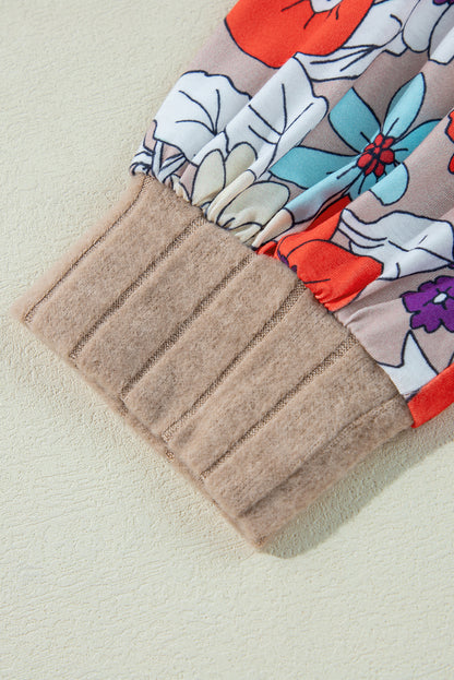 Langärmlige gerippte Bluse mit Patchwork-Muster und Blumenmuster