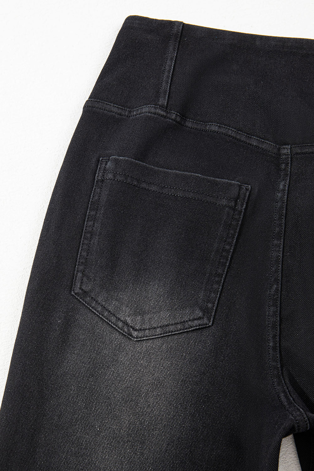 Schwarze, dehnbare Jeggings mit gewölbter Taille und schmaler Passform