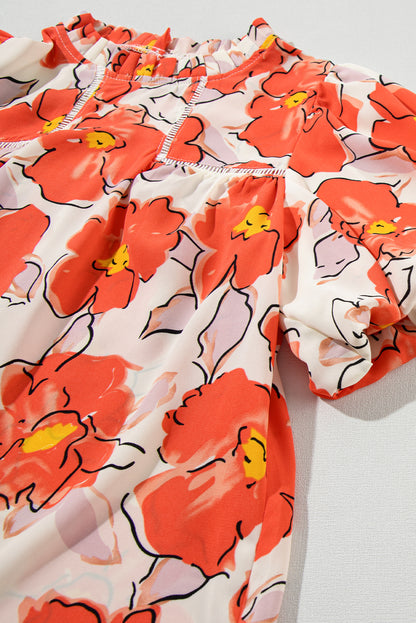 Orangefarbene Bluse mit Blumenmuster, Puffärmeln und Rüschenkragen