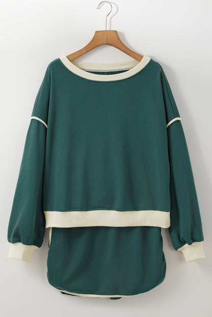 Evergreen Set mit lockerem Pullover in Kontrastfarbe und Skort mit Schnürung in der Taille